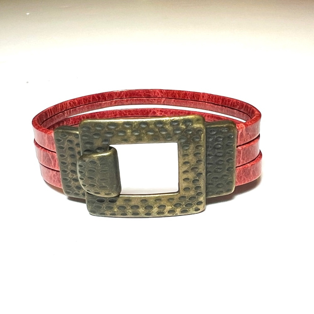 Distressed metal and leather bracelet